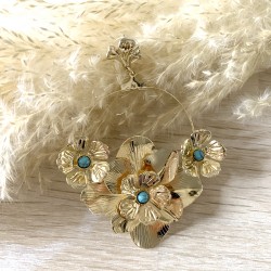 Boucles d'oreilles avec fleurs dorées