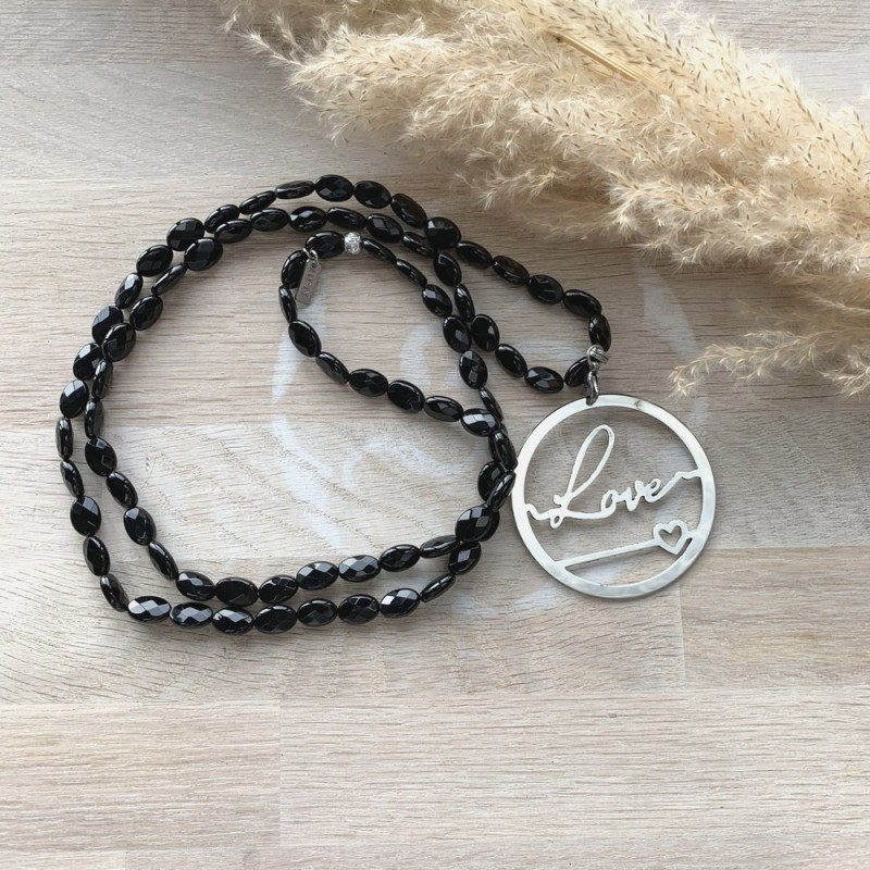 Collier perles noires facettées